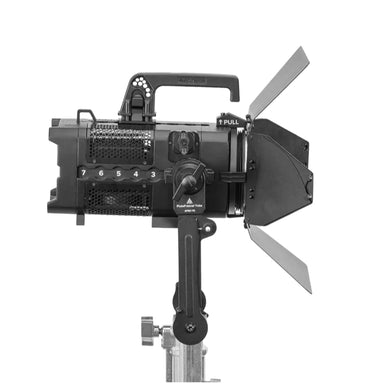 Astera Pluto Fresnel rear side view showing numbered control buttons, zoom knob with pull label, ventilation grille, barndoors and yoke mount, white background