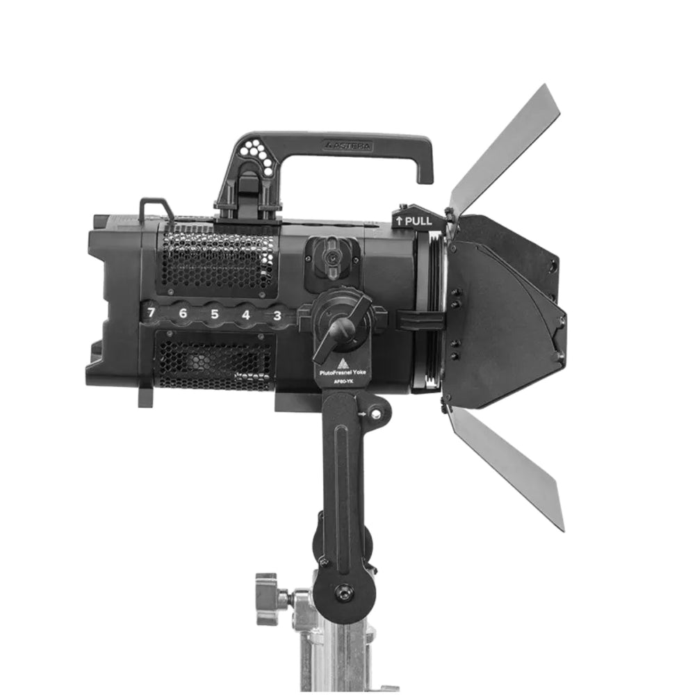 Astera Pluto Fresnel rear side view showing numbered control buttons, zoom knob, ventilation grille, barndoors, yoke mount and stand adapter, white background