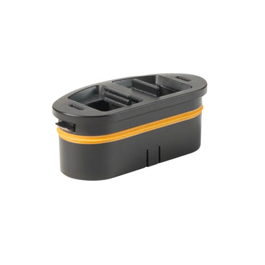 Astera QuikBeam QuikBrick charging cradle angle view showing top open with battery slots visible black unit with orange accent band white background