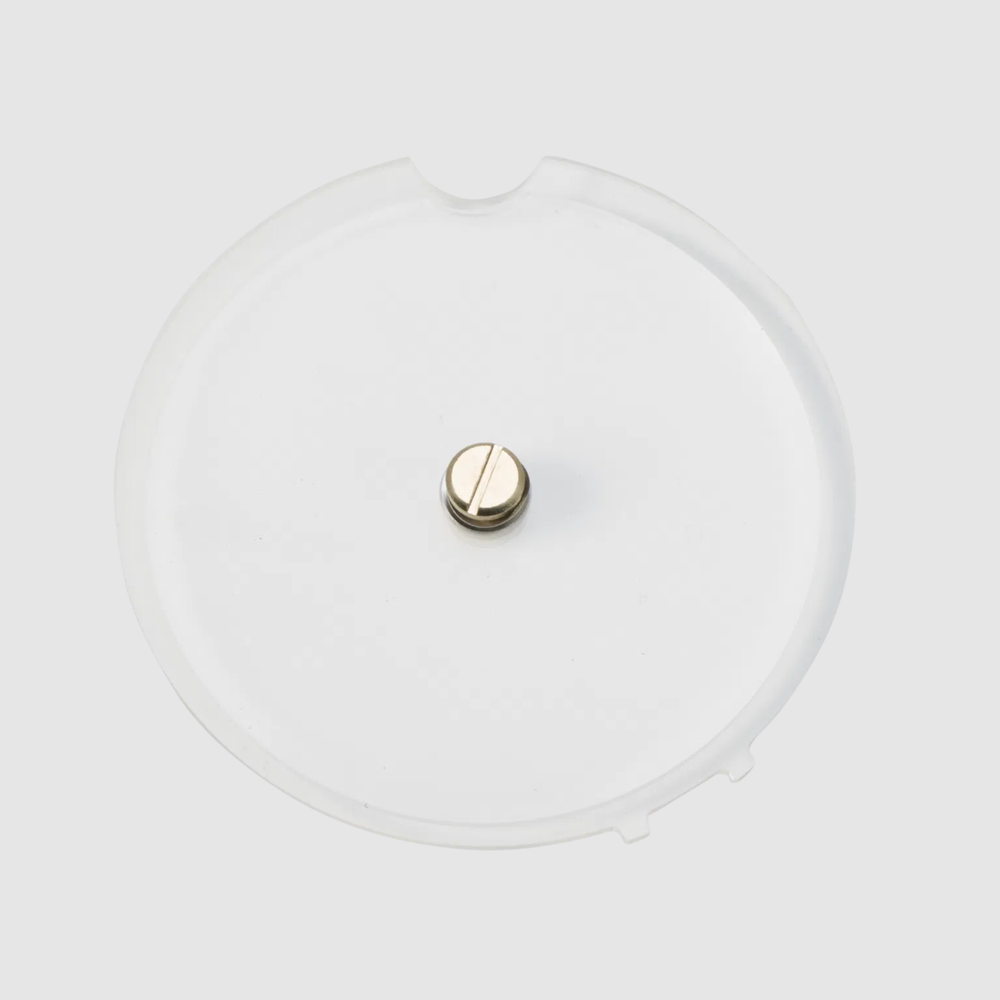 Astera QuikBeam rotatable elliptical filter top down view clear translucent disc with gold rotation knob in center white background