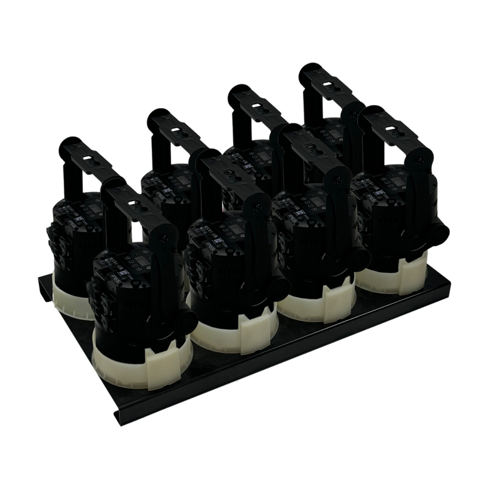 Astera QuikSpot Charging Plate with 8 QuikSpot units placed upside down in wireless charging cradles black plate with white charging contacts transparent background