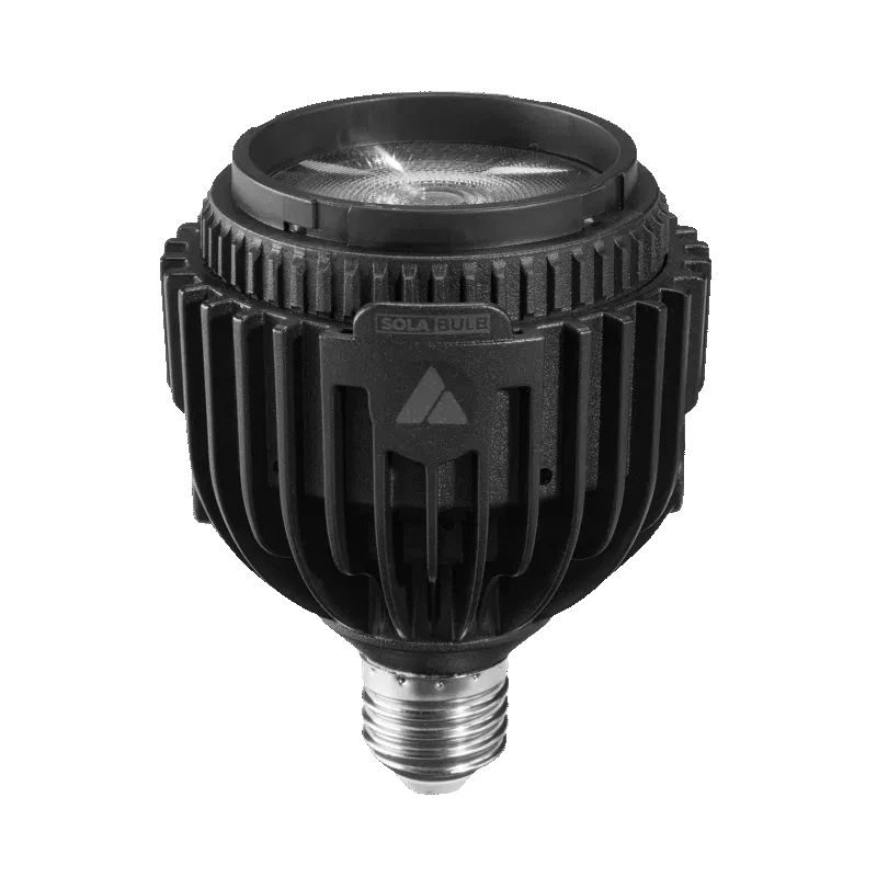 Astera SolaBulb Fresnel LED bulb angle view from above showing zoom-off wide beam Fresnel lens heat sink fins Astera logo and E27 screw base black bulb transparent background