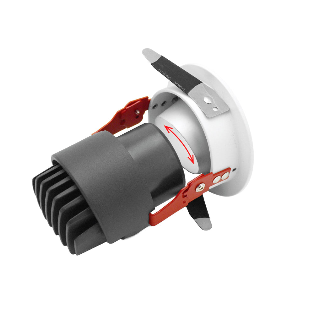Moss LED 3-Inch Recessed Downlight Dim-To-Warm rear close-up showing heat sink fins rotation arrows for tilt adjustment red spring clips silver reflector inside white trim white background