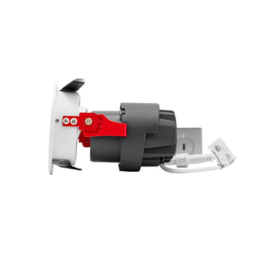 Moss LED 3-Inch Recessed Downlight Dim-To-Warm side rear view showing white trim flange red spring clip mechanism grey heat sink body and cable connector white background