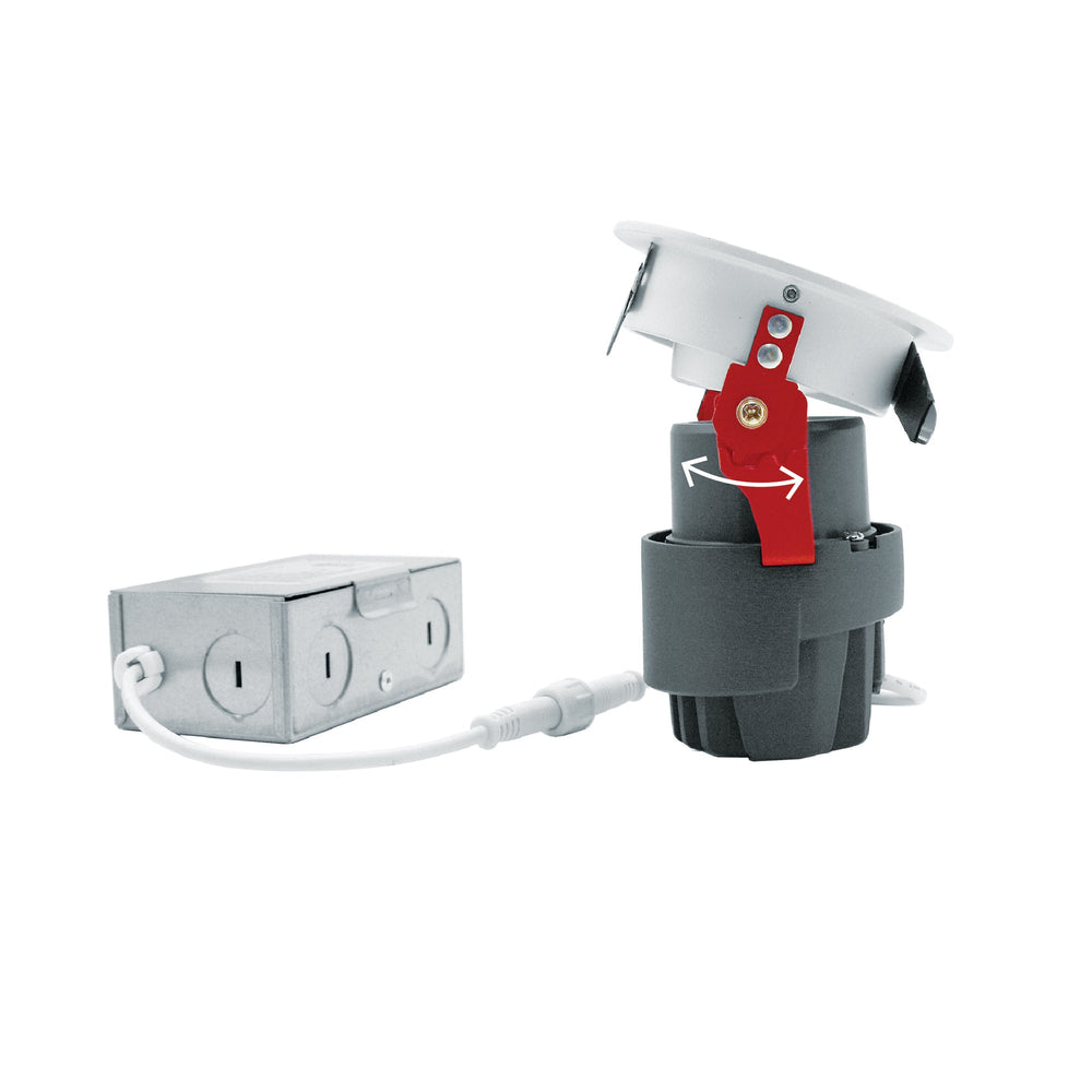 Moss LED 3-Inch Recessed Downlight Dim-To-Warm tilted angle view showing rotation feature with arrow on red spring clip aluminum junction box grey heat sink white trim white background
