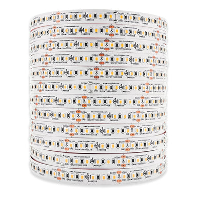 MossLED FlexLED 120 White 24V LED tape strip showing multiple rolls stacked with warm and cool white LEDs