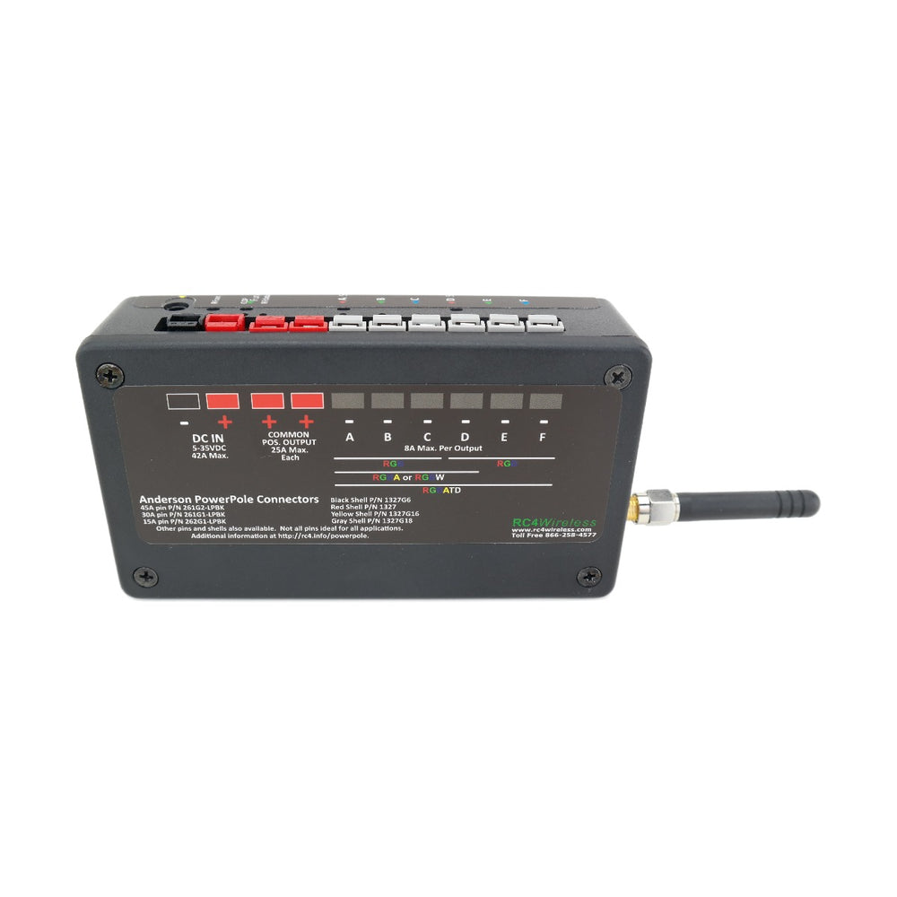 RC4 Wireless RC4Magic-900 Series 3 DMX6dim-500 high power 6-channel 42A wireless DMX dimmer back bottom view showing connection label DC IN 5-35VDC 42A Max channels A through F 8A each Anderson Powerpole connectors RGB RGBW RGATD crossfade info with 900MHz antenna on black housing on white background