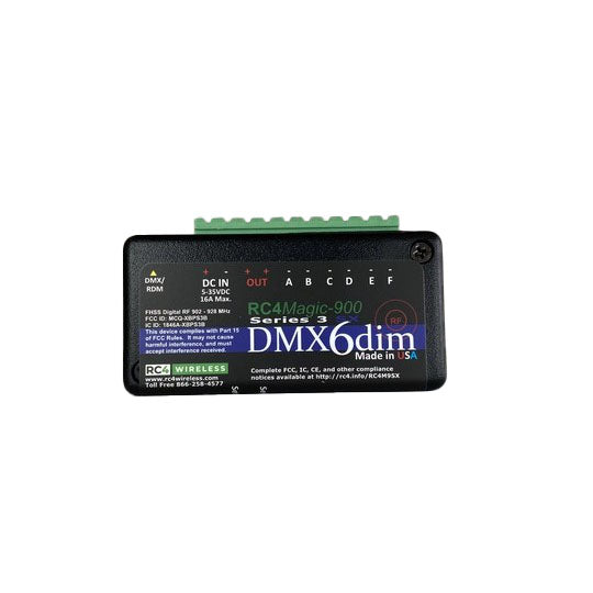 RC4 Wireless RC4Magic-900 Series 3 DMX6dim 6-channel wireless DMX dimmer front angle view with green Phoenix plug-in connectors showing screw terminal outputs A through F DC IN power connector DMX RDM input RC4Magic-900 Series 3 branding Made in USA on black compact housing on white background