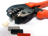 RC4 Wireless Anderson Powerpole crimping tool with orange ergonomic handles shown with assorted Anderson Powerpole connector shells and crimp pins for RC4Magic high power wireless dimmer installations on white background