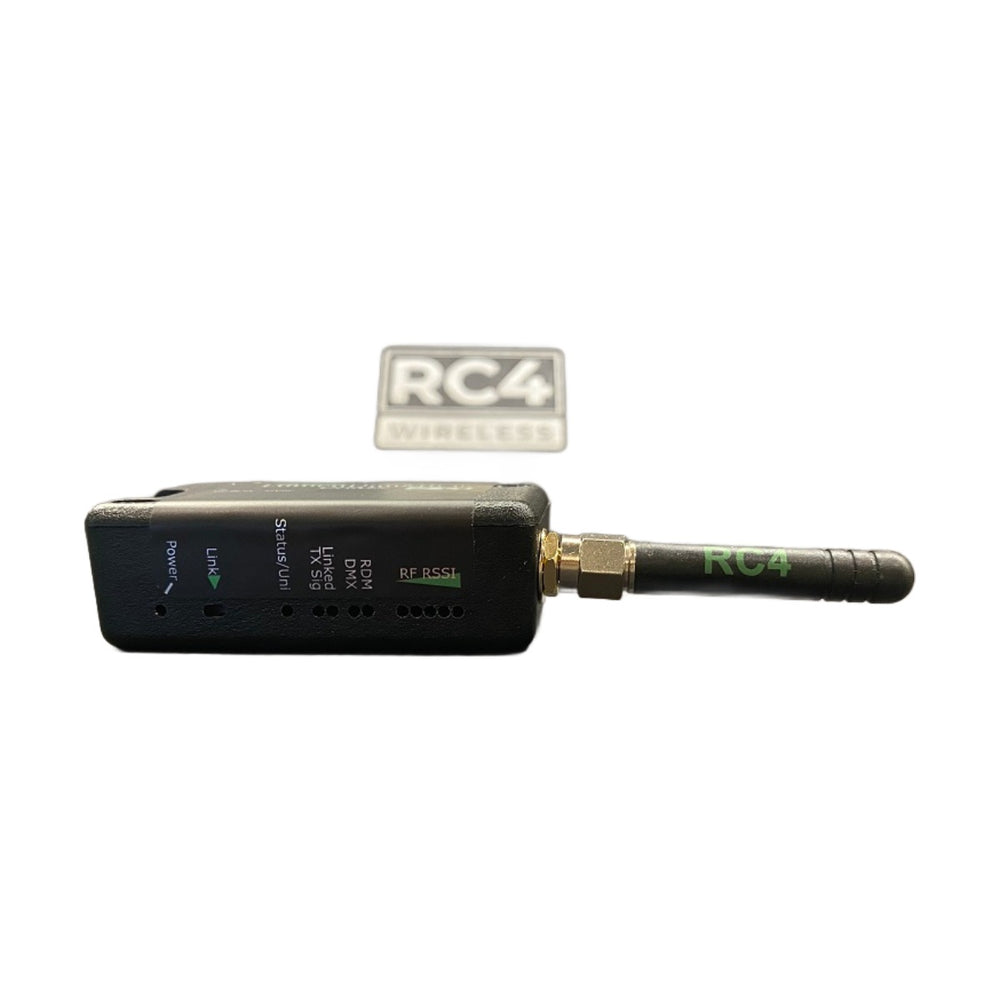 RC4 Wireless LumenDimMIOR2 CRMX wireless DMX RDM transceiver side view with SMA antenna attached showing LED indicators RF RSSI status lights and RC4 Wireless branding on white background
