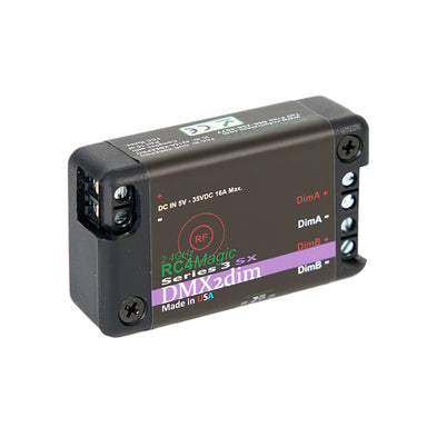 RC4Magic S3 DMX2dim 2-channel wireless dimmer front angle view showing DimA and DimB screw terminals, DC power input, purple stripe branding, black housing, white background