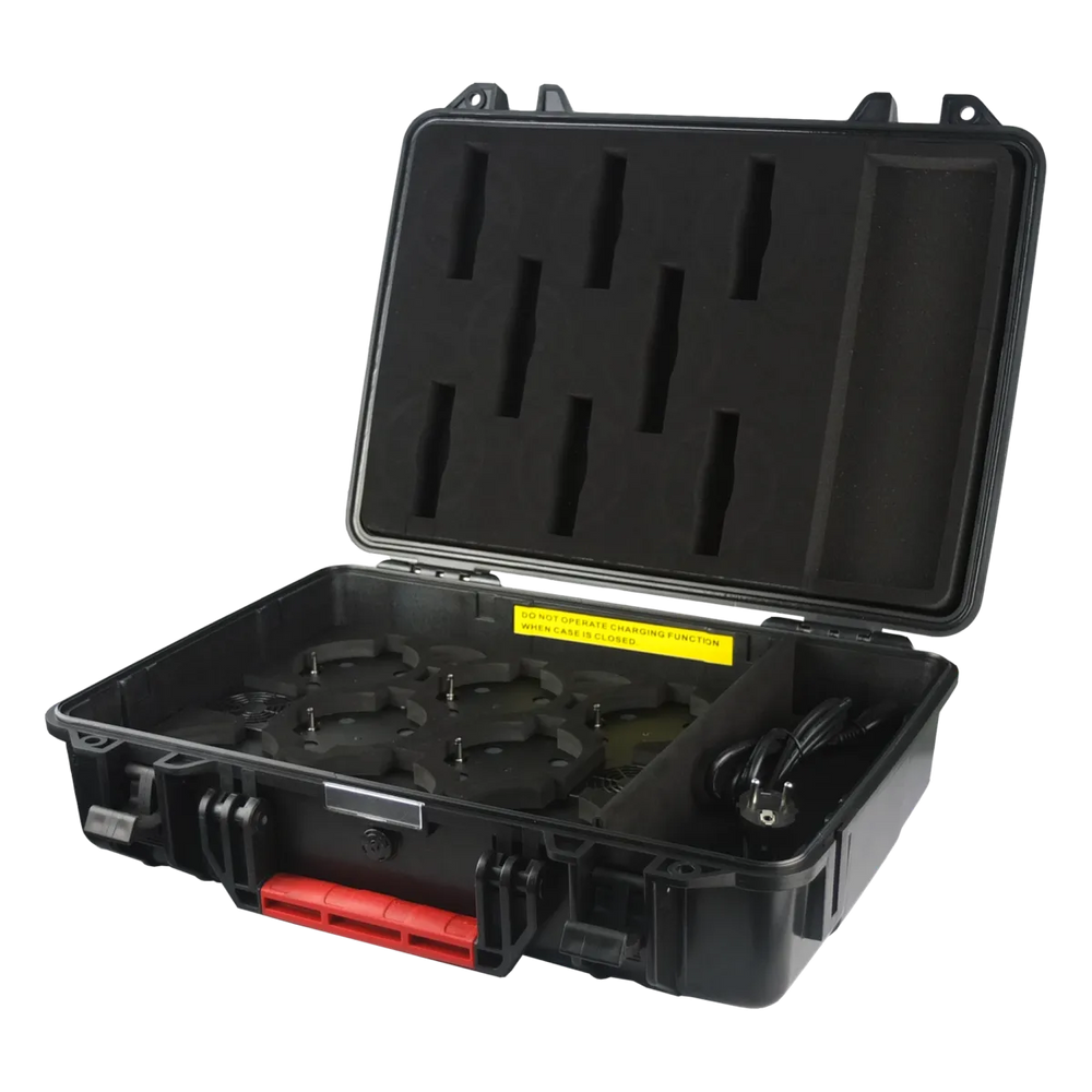 Astera AX3 LightDrop Charging Case open black hard case with foam cutouts for eight units DC charging connectors and red latches on transparent background