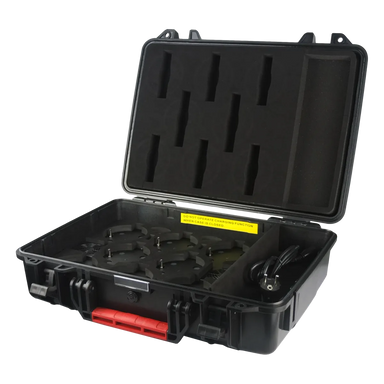 Astera AX3 LightDrop Charging Case open black hard case with foam cutouts for eight units DC charging connectors and red latches on transparent background