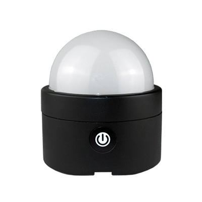 Astera AX3 Lightdrop with white dome diffuser attached on charging base with power button