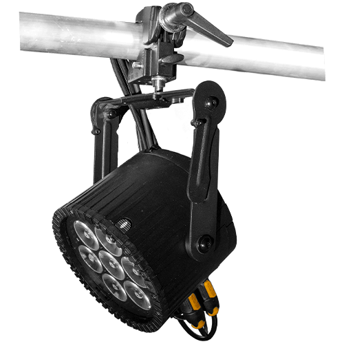 Astera AX9 PowerPAR LED wash light mounted on aluminum truss pipe via clamp hanging downward showing black housing with seven bright LED lenses yoke bracket and orange powerCON input output connectors for professional wireless film and event lighting on transparent background