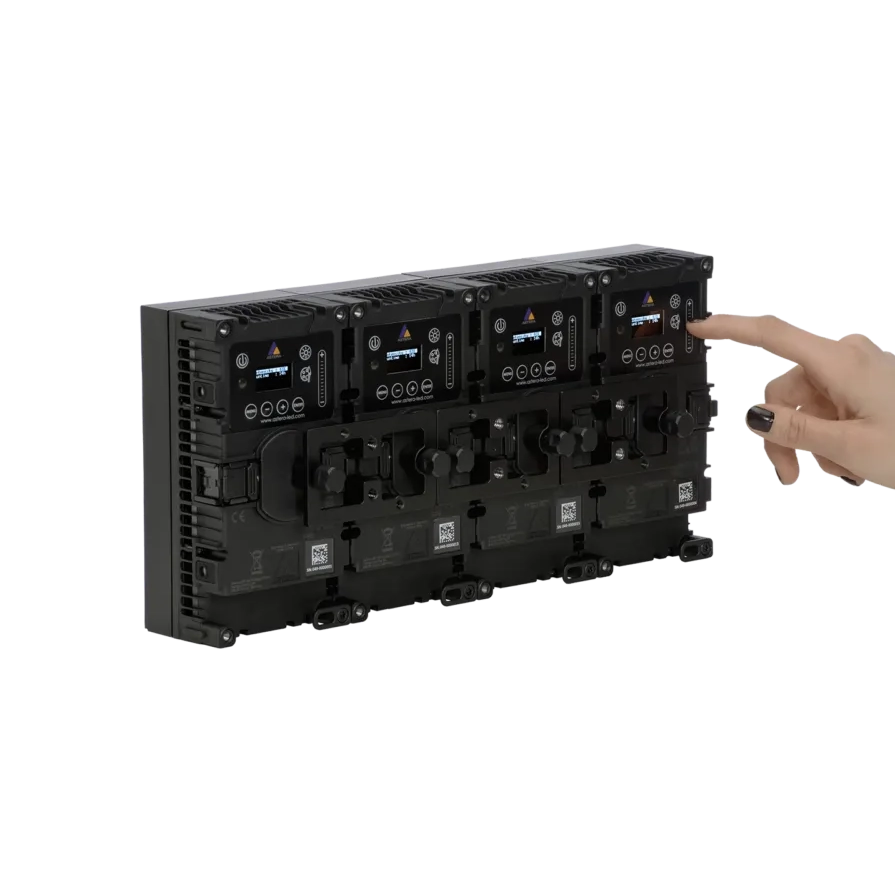 Astera ConnectorPlate for HydraPanel two panels combined rear view hand demonstrating LCD displays controls transparent background