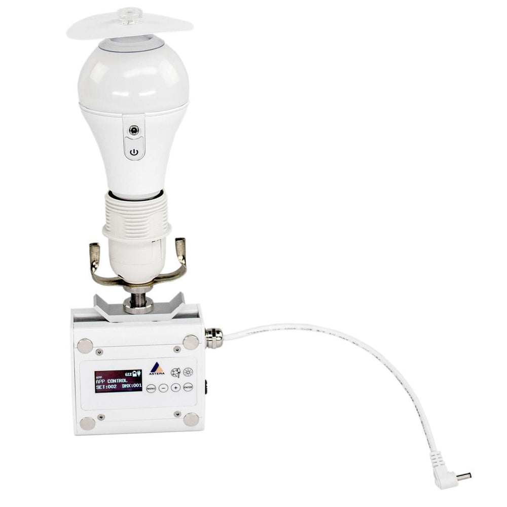 Astera NYX Bulb mounted on PowerStation base showing OLED display, control buttons, and gooseneck USB charging cable