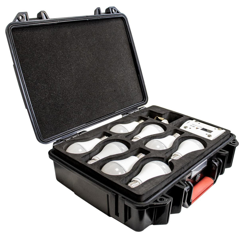 Astera NYX Bulb set of 8 in open charging case with power station, USB cables, and foam insert