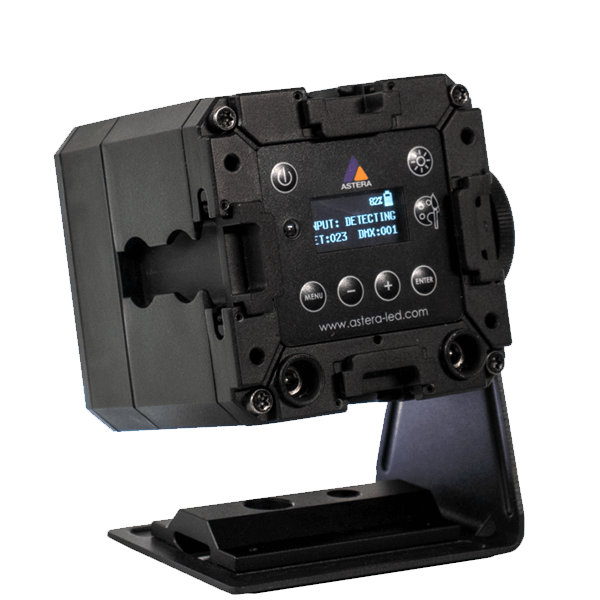 Astera PB15 PixelBrick rear panel view showing LCD display with DMX detecting status Astera logo navigation buttons power button battery indicator and XLR DMX connectors on black housing with tilt bracket for professional wireless LED lighting on transparent background