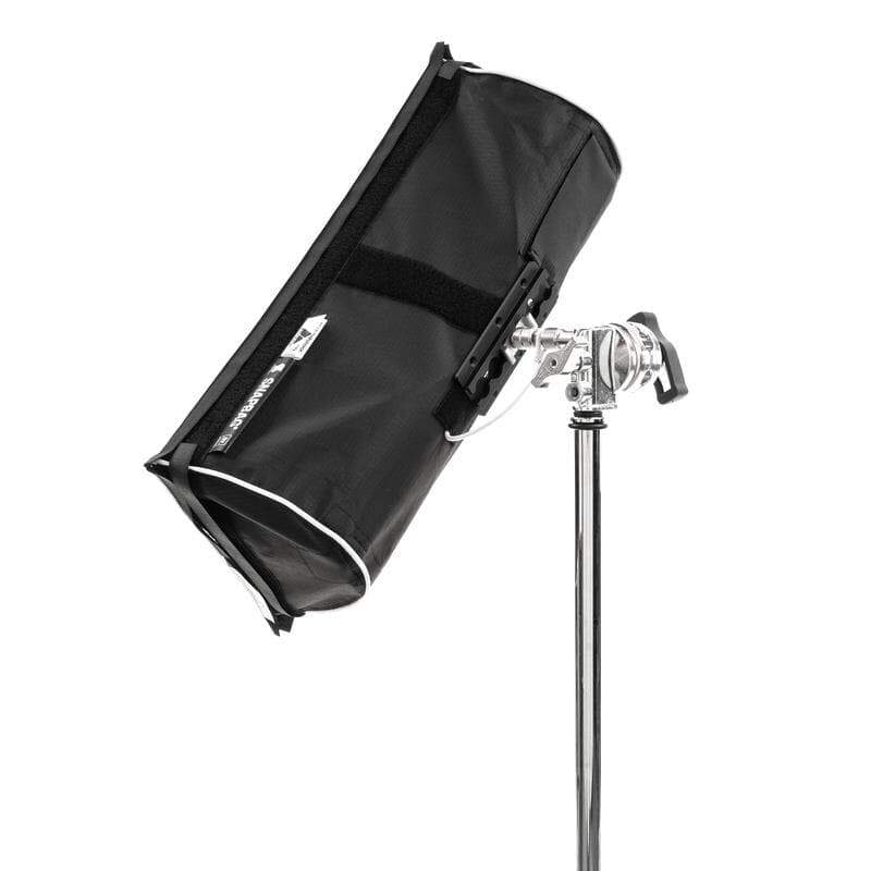 Astera SNAPBAG for Helios single tube rear angle view showing black nylon exterior mounted on C-stand with grip head on white background