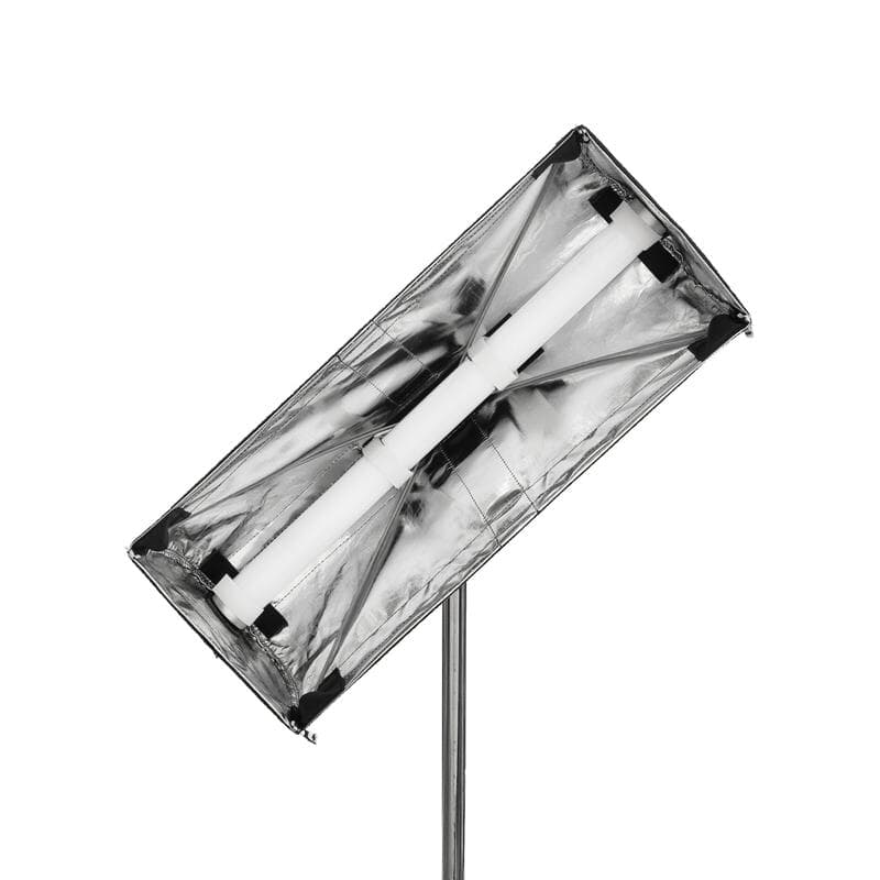 Astera SNAPBAG for Helios single tube softbox light modifier mounted on stand showing silver reflective interior with LED tube on white background