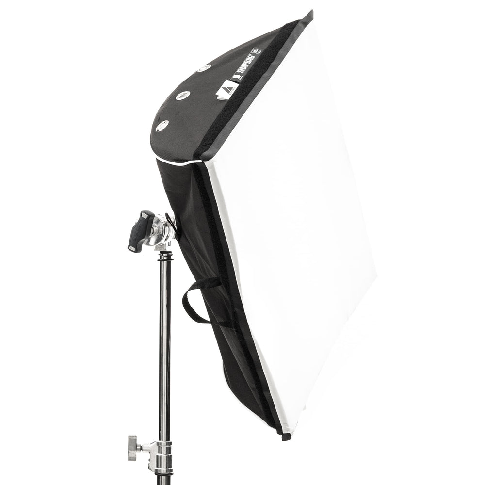 Astera softbox adapter SBAAT22 mounted on professional light stand side rear angle view showing large black fabric softbox modifier with Astera branding magnetic mounting points chrome stand hardware on white background