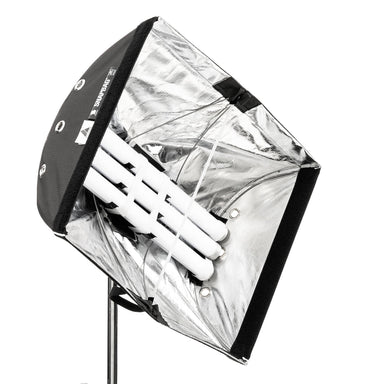 Astera softbox adapter SBAAT22 front angle view showing multiple Titan LED tube lights mounted inside open silver reflective softbox with Astera SnapLock branding black fabric exterior chrome light stand for professional film and photography lighting on white background