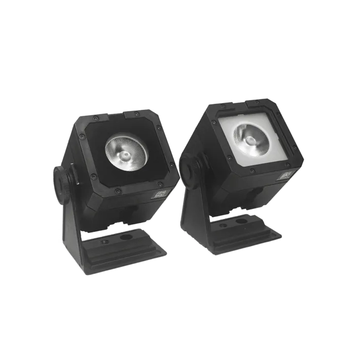 Astera StealthCover for PixelBrick two fixtures side by side comparison with cover installed and without cover showing lens black housing transparent background