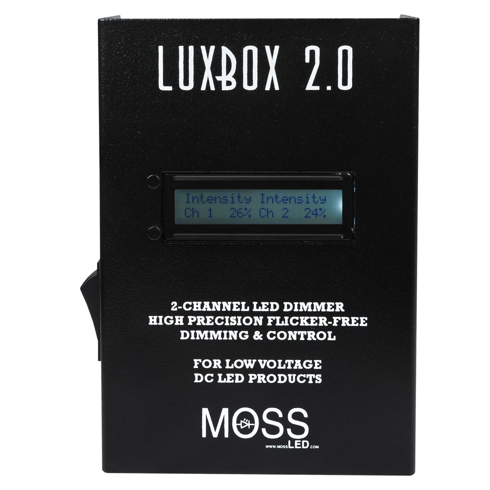 Moss LED LUXBOX 2.0 dual channel LED dimmer close-up showing LCD display with channel intensity readout and flicker-free dimming control branding