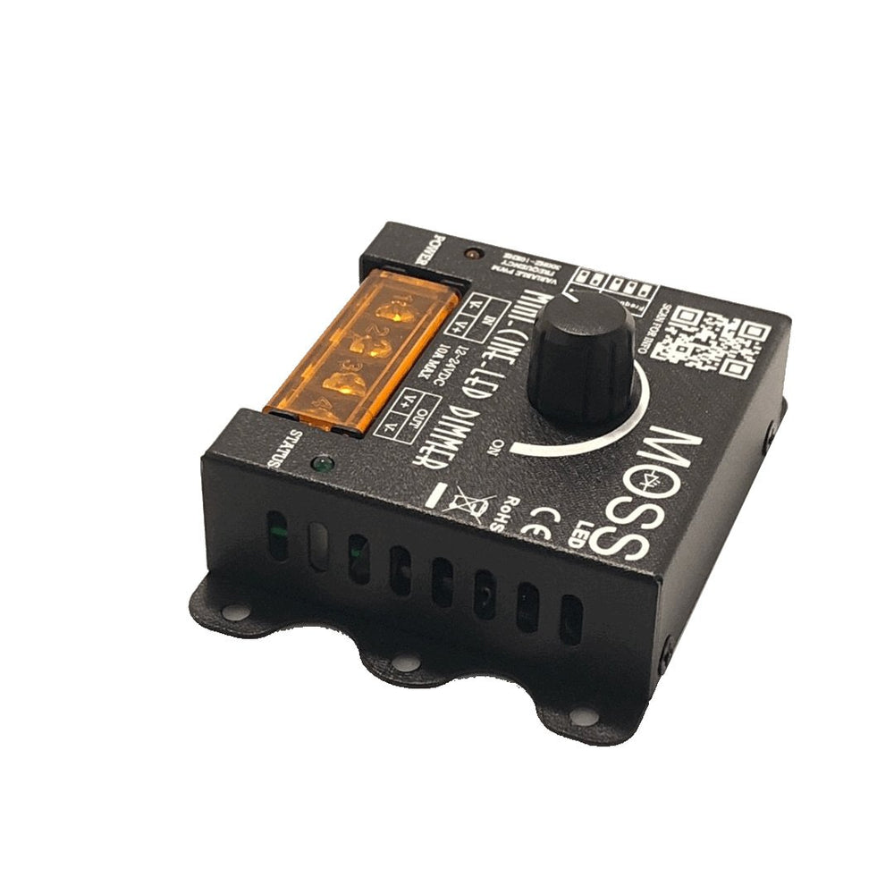 Moss LED Mini-Cine single channel rotary dimmer V2 back right angle view showing Mini-Cine LED Dimmer label green status LED orange terminal and Moss LED branding