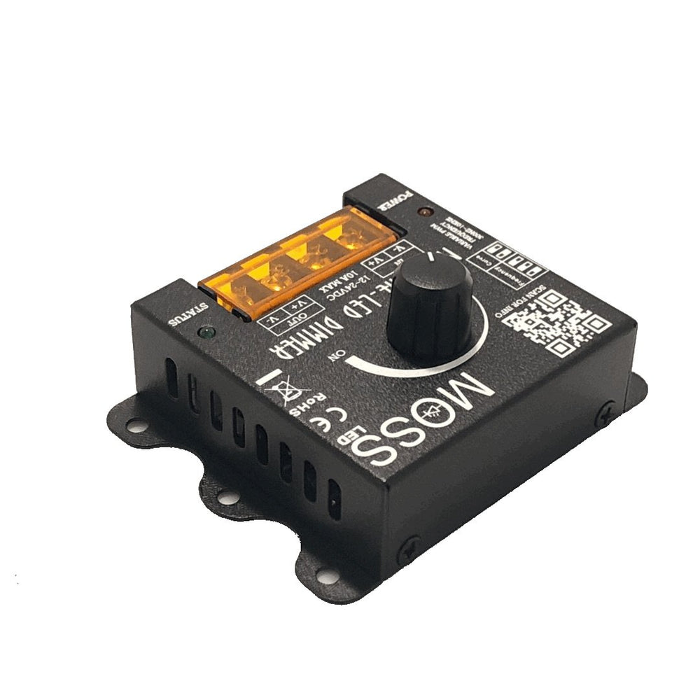 Moss LED Mini-Cine single channel rotary dimmer V2 front side view showing Moss LED branding ventilation slots orange terminal block and rotary knob on white background