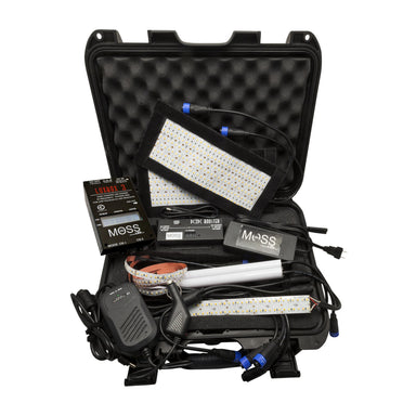 Moss LED Pluto Kit open NANUK 920 carrying case showing all included components bi-color FlexLED panels LuxBox V3 controller DC2DC booster power supply waterproof cables and LuxLines for on-location lighting