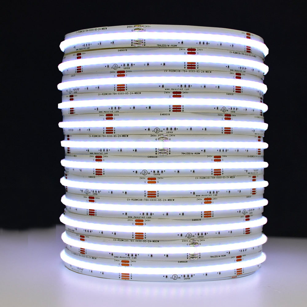 Moss LED SoftFLEX LED 784 RGBW 24V COB chip-on-board LED strip coiled reel illuminated with blue light on dark background