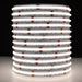 Moss LED SoftFLEX LED 784 RGBW 24V COB chip-on-board LED strip coiled reel illuminated with neutral white 4100K light on dark background