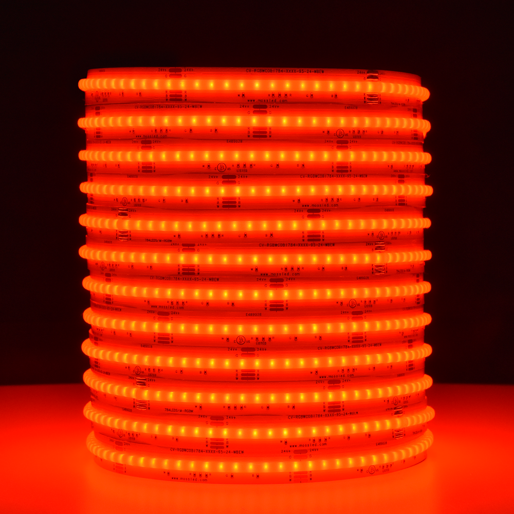 Moss LED SoftFLEX LED 784 RGBW 24V COB chip-on-board LED strip coiled reel illuminated with red light on dark background