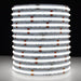 Moss LED SoftFLEX LED 784 RGBW 24V COB chip-on-board LED strip coiled reel illuminated with bright white light on dark background