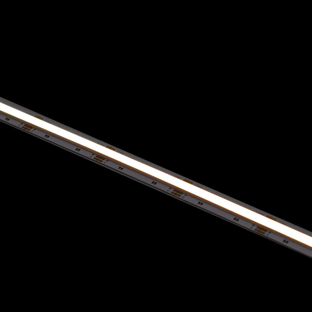 Moss LED SoftFLEX LED 1008 Dynamic White 24V COB LED strip illuminated warm white shown at diagonal angle on dark background