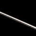 Moss LED SoftFLEX LED 1008 Dynamic White 24V COB LED strip illuminated warm white shown at diagonal angle on dark background
