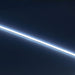 aMoss LED SoftFLEX Slim LED 528 6500K cool white 12V lit LED strip running diagonally on dark background
