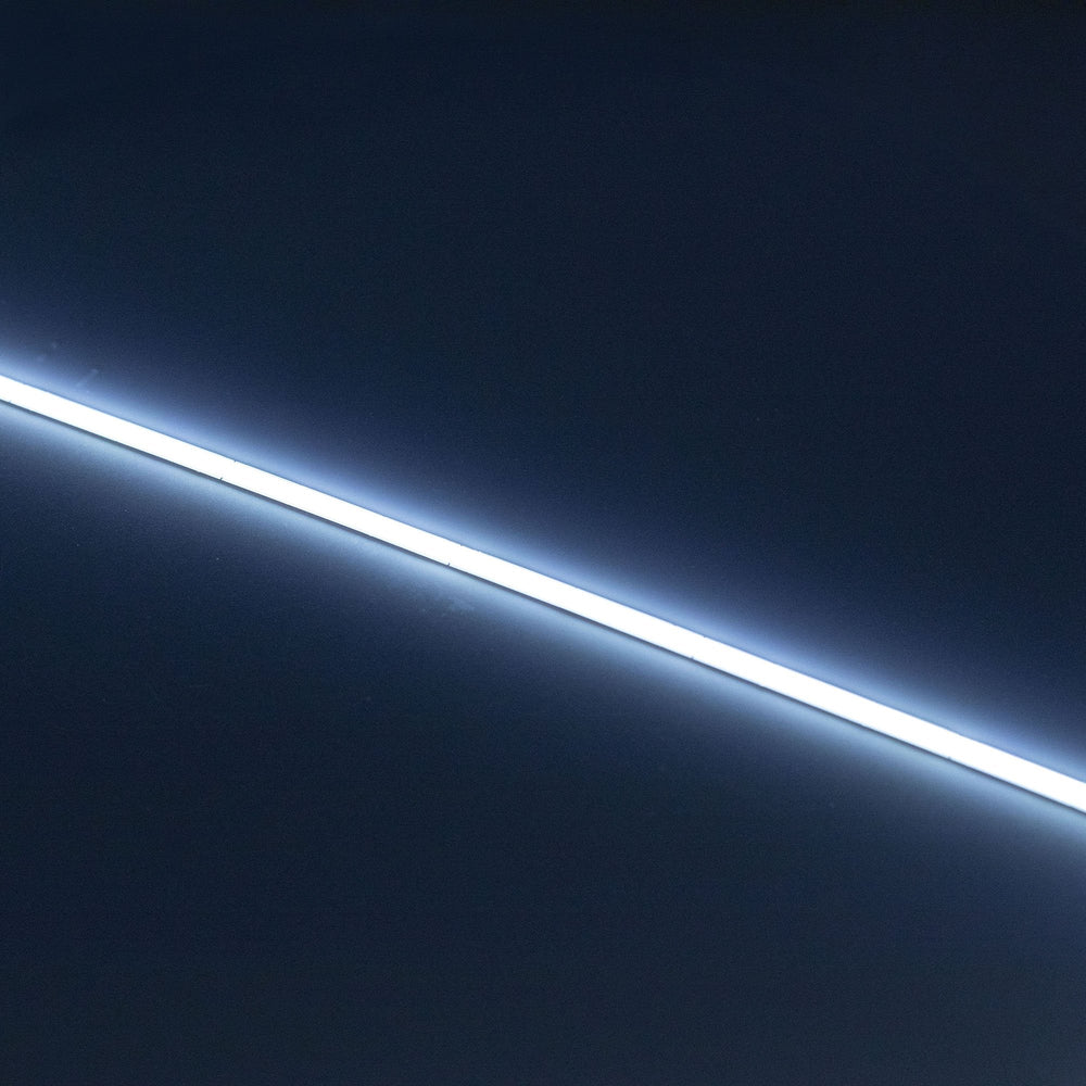 Moss LED SoftFLEX Slim LED 528 6500K cool white 24V lit LED strip running diagonally on dark background