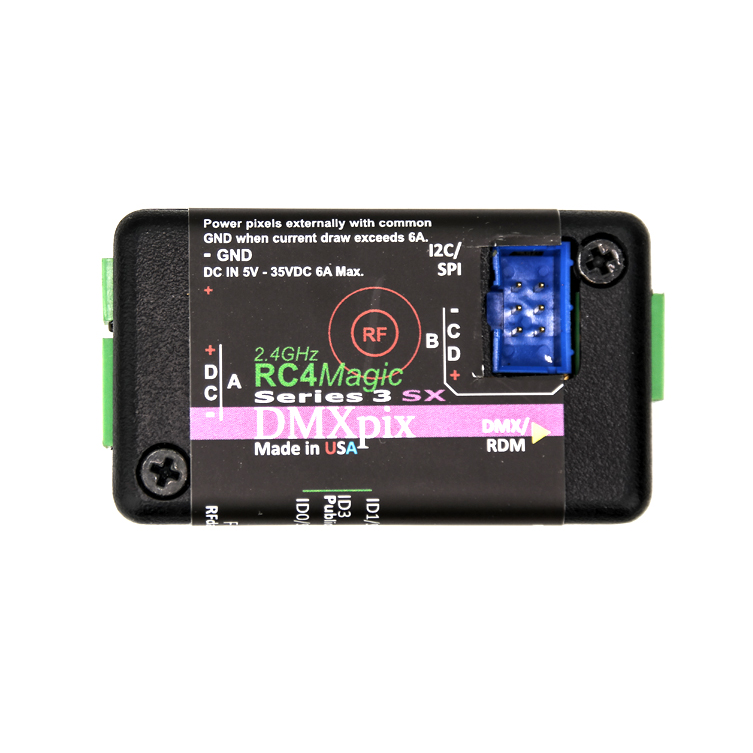 RC4 Wireless RC4Magic 2.4GHz Series 3 DMXpix dual pixel string driver top view showing product label with RC4Magic branding DMX RDM port I2C SPI connector DC IN 5-35VDC 6A Max GND RF indicator Phoenix connectors Made in USA on white background