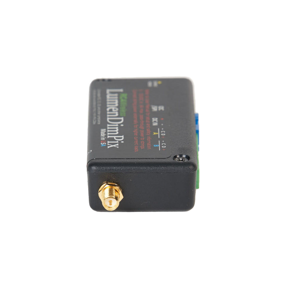 RC4 Wireless LumenDimPix wireless pixel DMX controller angled top view showing product label Made in USA SMA antenna connector and green blue pixel data connectors on black housing white background