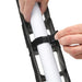 SNAPGRID 40 degree installation close-up showing hands securing velcro strap around Astera AX1 Titan tube to attach grid accessory