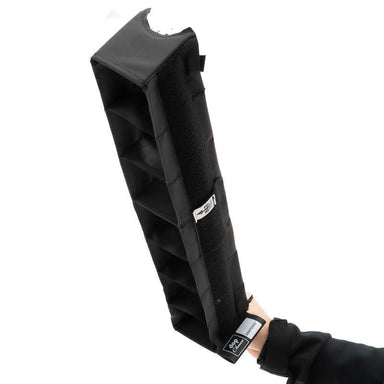 SNAPGRID 40 degree light control grid for Astera Helios rear side view showing black fabric exterior with grid cells held in hand