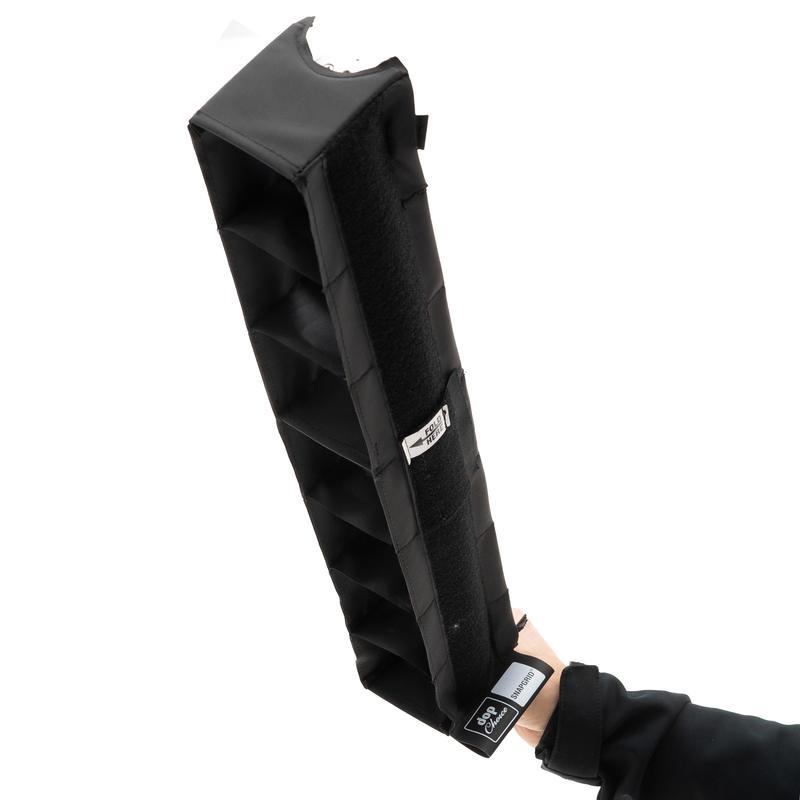 SNAPGRID 40 degree light control grid for Astera Helios rear side view showing black fabric exterior with grid cells held in hand