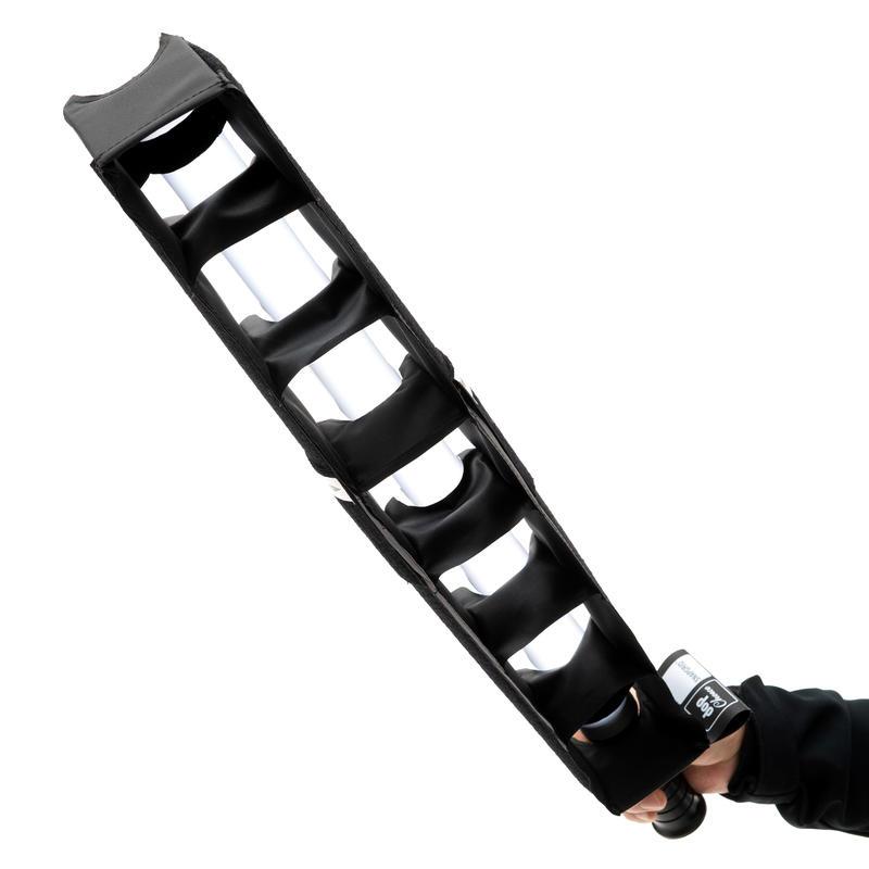 SNAPGRID 40 degree mounted on Astera Helios tube side angle view showing lit grid cells held in hand black fabric light control