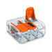 WAGO 221-413 spring-loaded quick-clamp splice connector 3-position close-up with one orange lever open showing transparent housing and wire insertion port